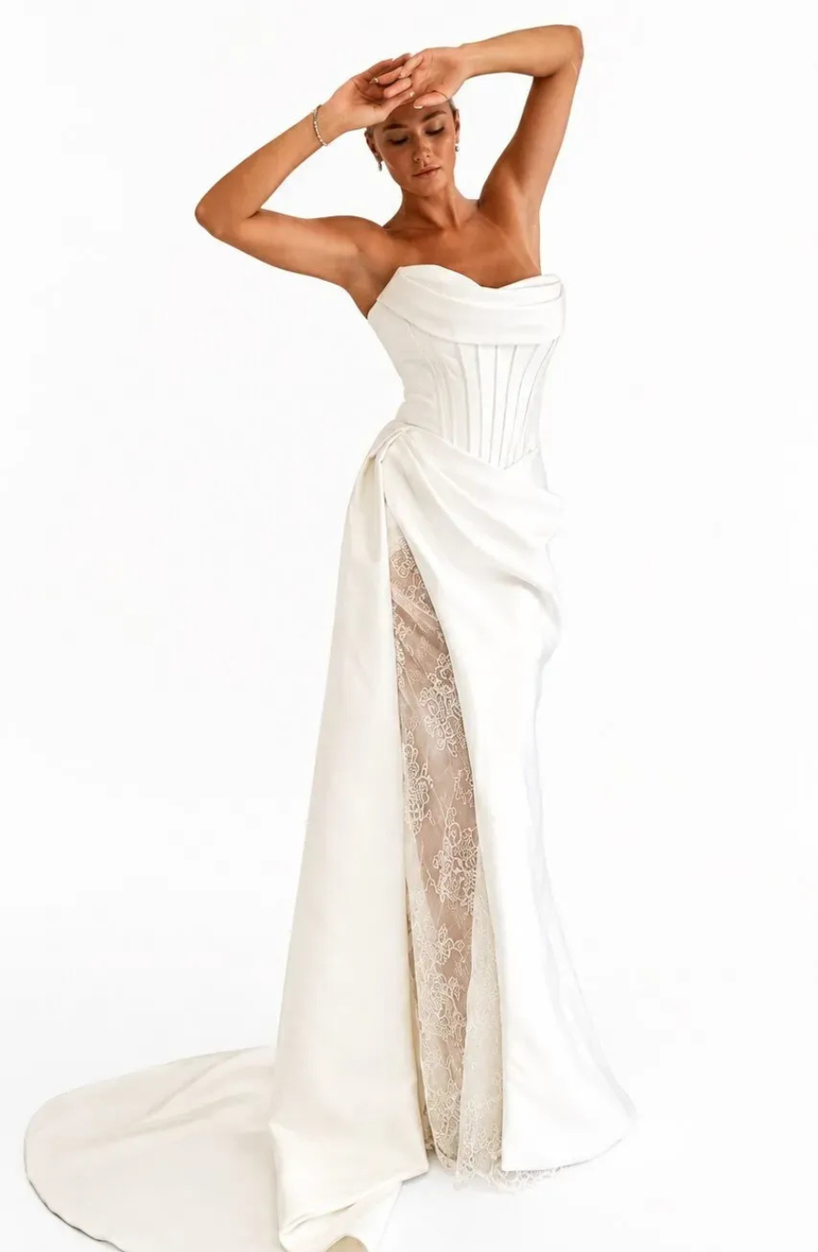 model is wearing a strapless bridal gown