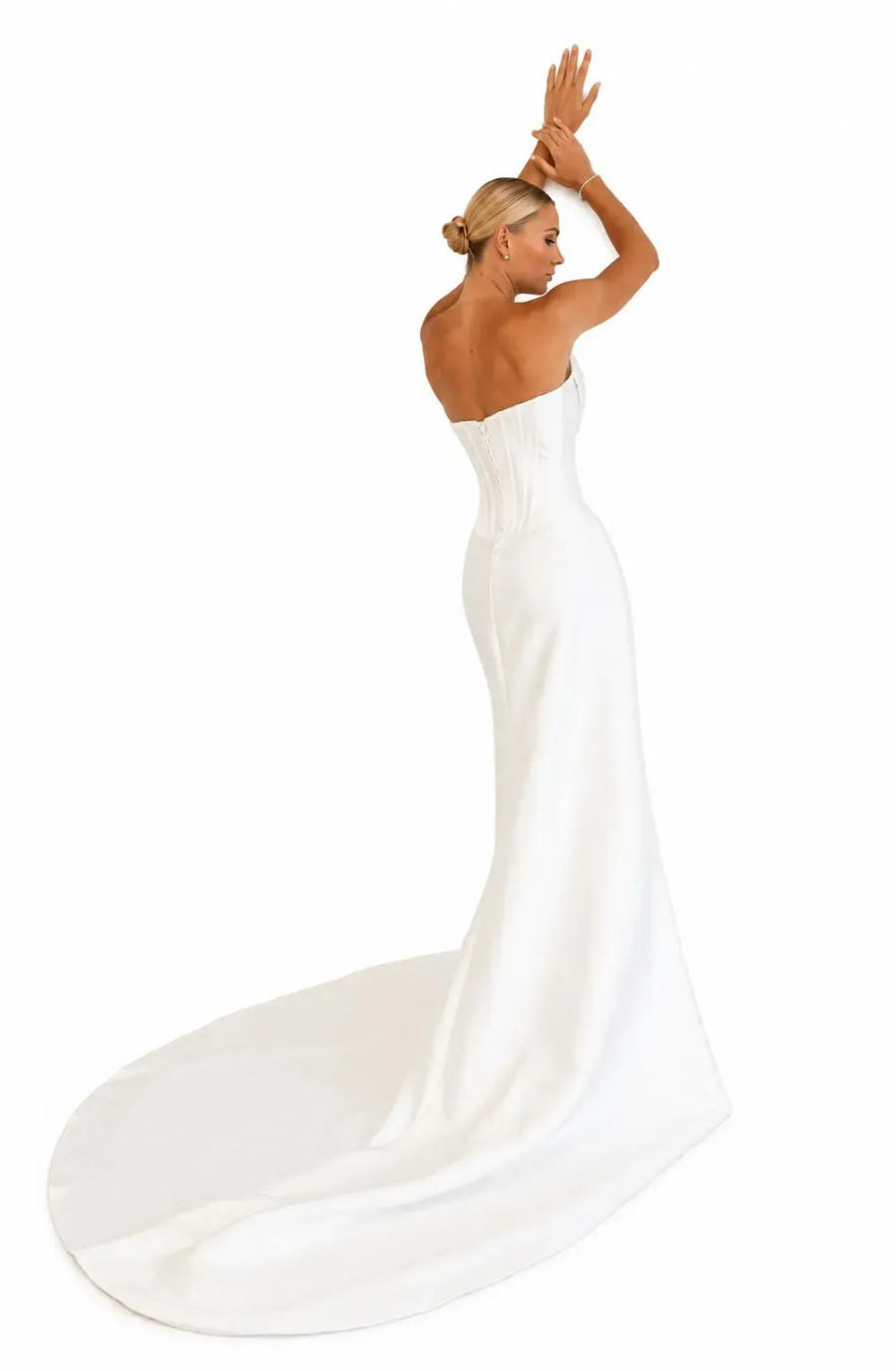 model is wearing a strapless bridal gown